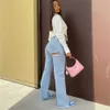 Designer de jeans de jeans 2023 Sexy Slim Fit Spring Fashion New High Caist Hole Hole Pergui Slit Jeans Casual Calças Capris para Lady Streetwear