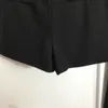 23ss marca de diseñador pantalones cortos para mujer Xiaoxiang bolsillo falso traje de cintura alta pantalones calientes de verano pantalones cortos fin delgado ropa para mujer a1 1GMP