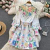 Nya kvinnliga klänningar sommaren 2024 Runway Fashion Floral Print Bohemian Dress O-Neck Long Lantern Sleeve Knappar Up Belted Mini