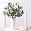 Fleurs décoratives 6 bâtons par paquet Faux feuilles d'eucalyptus ensemencées tige artificielle dollar en argent plante pour la décoration de mariage
