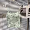 Arbetsklänningar sommaren 2023 Ankomst ärmlös broderi Camisole Elastic midja Ruffles Lång veckad kjol Tvåbit Set Ge736