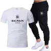 رجال المسارات ، رجال القطن بيع العلامة التجارية الصيفية tshirtpants بدلة الترفيه اللياقة البدنية الركض السراويل أزياء Hiphop Tshirt 230310