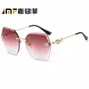Sunglasses designer New women's elegant Bow Set Diamond cutting rimless glasses UE60