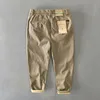 Męskie spodnie hiqor męskie spodnie zimowe flacee men bawełniane solidne luźne spodni w stylu safari kieszonkowy khaki armia zielona praca pant 28-38 230310