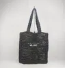 Bolso de hombro tejido con cuerda de papel de calidad, bolsos de playa, bolsos huecos con letras fotográficas versátiles, viajes de ocio