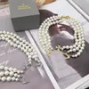 Designer Multilayer Pearl Rhinestone Orbit Halsband ClaVicle Chain Barock Halsband för kvinnors smyckespresent