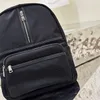 Luxurys Designer noir Sac à dos en nylon Sacs à dos p Mode grande capacité Sac femme cartable voyage vacances semaine et sacs de sport Triangle sac à main sac d'école en tissu P