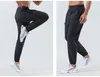 Lulu Sport Uomo Pantaloni Jogger Pantaloni lunghi Ciclismo Coulisse Palestra Tasche Pantaloni sportivi Pantaloni uomo Uomo Casual Elastico in vita Fitness Esercizio Atletico Limone