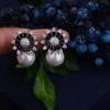 Kolczyki Dangle żyrandol 31 mm symulowany Pearl Sunflower Design Cuubic Criconia Kobiety Engagment Night Out Anniversary Sutyna