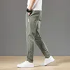 Herrbyxor vår sommarstärm herrbyxor mode klassiska dragkammare elastisk midja jogging tunt stretch casual grå lastbyxor man 230311