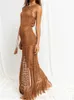 Kvinnors badkläder Kvinnor ihålig ut stickad bikini -täckning är ärmlös se genom Tassel Long Dress Summer Bohemian Y2K Sexiga strandklänningar Y230311