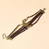 Braccialetti con ciondoli Bracciale multistrato in pelle intrecciata vintage Regolabile Acciaio inossidabile Uccello fortunato Albero della vita Gioielli e accessori