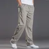 Männer Hosen Mens Casual Cargo Baumwolle Hosen Männer Tasche Lose Gerade Hosen Elastische Arbeit Hosen Marke Fit Jogger Männlich super Große Größe 6XL 230311