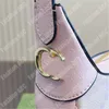 Macaron Womens Designer axelväskor Luxurys handväskor för damer mode axelväska klassisk guldspänne måne handväska