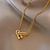 Chaînes femme rétro sexe coeur clavicule chaîne tempérament Ins vent pendentif lien cubain à la mode mode titane acier collier