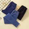 Damskie ubrania dżinsowe 5xl 6xl elastyczne damskie dżinsowe dżinsy mody mody swobodne kobiety czarne/ niebieskie mamo dżinsy chude dżinsowe spodnie 230311