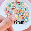 Dekoratif figürinler 100pcs mini sevimli 6mm çiçek serisi düz arka reçine cabochons scrapbooking diy mücevher zanaat dekorasyon aksesuar