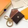 Designer Letter Wallet Keychain Keyring Fashion Turne Hanger Auto Charm Charm Bruine Flower Mini Bag Trinket Geschenken Accessoires No B173T