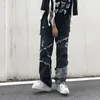 Män s jeans tassel svart baggy rak bred ben last byxor man streetwear harajuku stil vintage tvättade rippade denimbyxor 230311