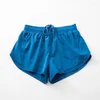 Promoção de shorts femininos Pontas rápidas de calça de falha de falha de malha