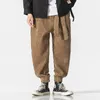 Pantaloni da uomo invernali Cintura giapponese in velluto a coste Harem Pantaloni sportivi da jogging casual Hiphop Street Uomo di grandi dimensioni M5XL 230311