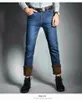 Jeans maschile classico caldo per uomo nero allungamento denim in filo maschio inverno foderato più taglia 28-401