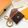 Designer Letter Wallet Keychain Keyring Fashion Turne Hanger Auto Charm Charm Bruine Flower Mini Bag Trinket Geschenken Accessoires No B173T