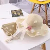 Chapeaux 2 pièces/ensemble enfants été paille marguerite tissé parasol chapeau sac à main costume enfant bébé fille fleur visière soleil casquette photographie accessoires