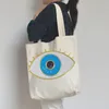 Notions Remendo bordado com olhos azuis malignos grande Ferro na costura para roupas Remendos de lantejoulas com brilho Apliques faça você mesmo Jaquetas Camisetas Bolsas