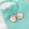 2023-Europe America Fashion Style Lady Women Titanium Steel White Mother of Pearl V Initialer Round Stud Earrings 3 Color