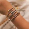 Bangle Trend Rostfritt stål Spikade armband Lyxvarumärke Styliska skruvar älskar hjärtkristallarmband för kvinnor Män dekorationsmycken 230313