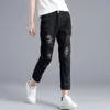 Damesjeans 2023 Summer S gescheurde gat voor vrouw hoge taille niet-elastische casual denim broek vrouwelijke mode mom pants