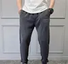 Męskie spodnie do ciała designerskie spodnie na świeżym powietrzu bawełniany solidny kolor kombinezonu ucha uliczne proste spodnie męskie Pockets Casual Sports Jogging Pants Asian rozmiar