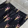 23SS Femmes Designer Deux pièces Pantalons Ensembles avec motif de crème glacée Filles Marque Milan Runway Jersey Jogging Sweat à capuche Veste d'extérieur Crop Tops Bomber et pantalons amples