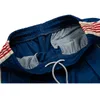 Męskie spodnie joggery niebieskie dres menu kobiety na zewnątrz igły na zewnątrz spodnie ciągnące spodnie linowe pasiaste haft motyla 230313