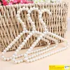 100 st. Vacker 20 cm Pearl Kid Baby Pet Dog Clothers Hanger Plastic White Hangers For Clothing Shophome Tvättprodukt