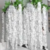 Flores decorativas grinaldas 20pcs/conjunto Wisteria artificial Flores pendurados Rattan Flores de noiva Garland Decorações de Natal para jardim de casa El Wholesale 230313