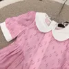 23ss märke Designer barnklänning Dockkrage Mode full presbyopi-logotyp klänningar tjejer söta skjortklänningar Ren bomull Barnkjol Babykläder a1