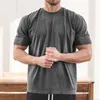 T-shirt da uomo Uomo Palestra Allenamento Fitness T-shirt in cotone a maniche corte Hip Hop Fitness Estate Oversize Bodybuilding Top T-shirt sportive 230311