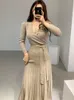 Sukienki swobodne rozciągliwe kobiety dzianiny ołówek bodycon sukienka jesienna zima solidne vestidos długie rękawowe V szyja szczupła dama elegancka koreańska sukienka 230313