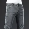 Mäns jeans Herrens avslappnade mager jeans mitt midja bekväm rak elasticitet klassisk stil blå denim byxor man grå byxor 230313