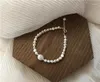 Strand naturligt sötvatten pärla oregelbunden 5-10 mm fashionabla enkelt armband tibetansk silverlås