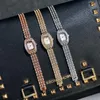 Armbandsur Kvinnor tittar på lyx fullt is av mode guldklocka diamant strass för armbandsur relojes para mujer relogio