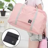 Förvaringspåsar Portable Nylon Folding Travel Stora kapacitet bagagetillbehör Vattentäta handväskor Kläder garderob arrangör