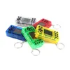 Mini handhållna bärbara spelspelare retro spelbox nyckelring inbyggd i 26 spelkontroller mini videospel konsol nyckel hängande leksaksfall