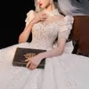 2023 Arabic Wedding Dresses Sweetheart Satin short sleeve Vintage Sashes Ruched Sexy Open Back huge ball gown crystal beaded blingbling Bridal Gowns