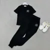 23SS مصممة مصممة المسارات مجموعات سراويل من قطعتين مع جميع رسائل Girls Runway Brand Jersey Lawging T Hirts Tee Tops و Pantging Pants Activewear Suit