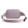 Midjeväskor Kvinnor Midjeväska Kvinnlig plånbok Purse Casual Belt Pouch Nylon Travel Motorcykel Fanny Pack Banana Bag Bolsa Cintura 230311