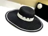 Xbwf wide rquir chapeaux Bucket Fashion Luxury Brand Designer Hat pour femmes hommes P Famille Pu Leather Casquets en herbe