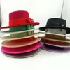 Chapeaux à larges bords Chapeaux seau Noeud papillon Chapeau Fedora Hiver Rond Surface bosselée Haut plat Noeud papillon Bande élastique Chapeau de jazz rouge pour hommes et femmes Fedora 230314